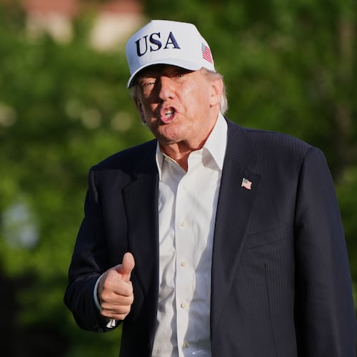 President Donald Trump gestures to reporters as he walks across the South Lawn of the White House, Friday, May 15, 2026, in Washington, on return from Beijing where he met with China's President Xi Jinping. (AP Photo/Jacquelyn Martin)