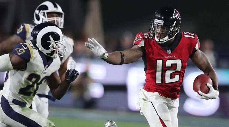 January 6, 2018 Los Angeles: Falcons wide receiver Mohamed Sanu makes a long first down reception on a touchdown drive against the Rams during the fourth quarter in their NFL Wild Card Game on Saturday, January 6, 2018, in Los Angeles. Curtis Compton/ccompton@ajc.com