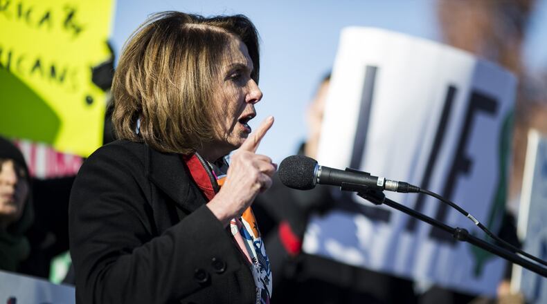 House Minority Leader Nancy Pelosi speaks during a rally against the Republican tax plan on Dec. 13, 2017 in Washington, DC. (Photo by Zach Gibson/Getty Images)