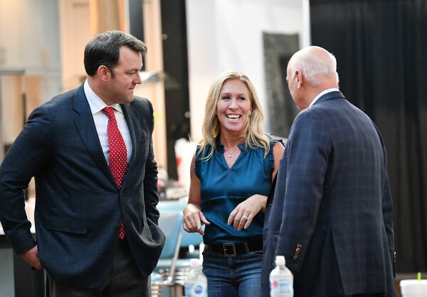 U.S. Rep. Marjorie Taylor Greene (center) speaks with State Senators Burt Jones (left) and Brandon Beach during the "2020 Election Integrity Townhall" meeting at The Lewis Loft in Rome, Georgia on Tuesday, July 13, 2021. (Hyosub Shin/Atlanta Journal-Constitution/TNS)
