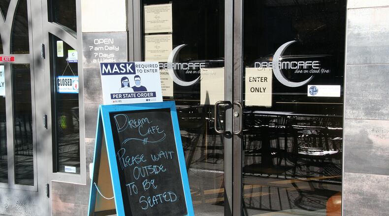 Mesa County, Colorado’s 5-star certification program requires local businesses to enact covid-related public health directives. Patrons of Dream Cafe in downtown Grand Junction must wear masks before entering and wait outside before being seated. (Christie Aschwanden)