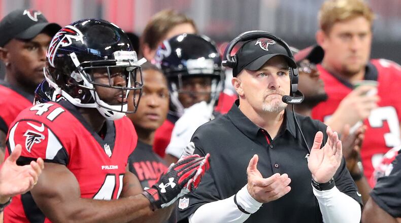 August 31, 2017 Atlanta: Falcons head coach Dan Quinn applaudes his defense after a third down stop against the Jaguars during the first quarter in a NFL preseason football game on Thursday, August 31, 2017, in Atlanta.    Curtis Compton/ccompton@ajc.com