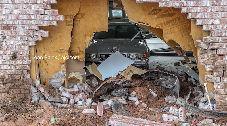 No one was injured when the vehicle went through the residence in the 2500 block of Wyncreek Drive.