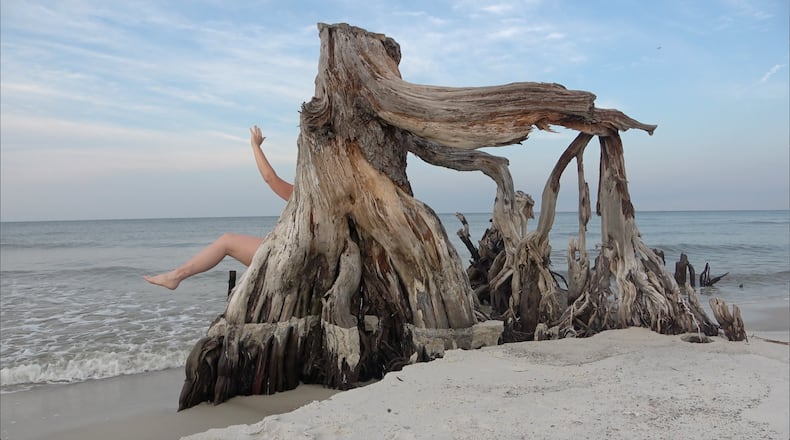 Jaime Bull’s "The Stump Hole" includes  soft sculptures of the female body exhibited alongside two photographs of differently arranged figures on Florida beaches.