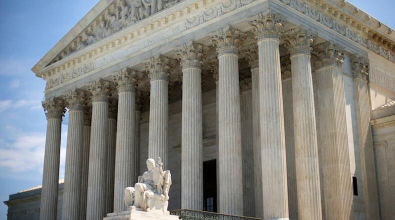 In this June 30, 2014file , the Supreme Court building is seen in Washington. Conservatives who care about the court say they have no such worry this time around. They feel confident that whomever President Donald Trump nominates for the Supreme Court, they wonât be looking back with regret in the years to come. (AP Photo/Pablo Martinez Monsivais, File)