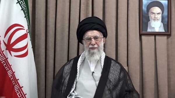 This photo released on Wednesday, June 18, 2025, by the official website of the office of the Iranian supreme leader, shows Supreme Leader Ayatollah Ali Khamenei in a televised speech, under a portrait of the late revolutionary founder Ayatollah Khomeini. (Office of the Iranian Supreme Leader via AP)