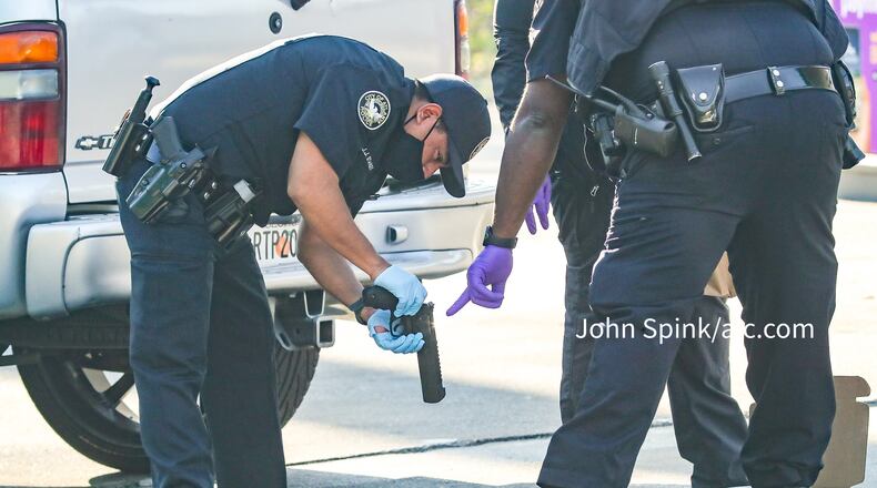 One man was shot at a northwest Atlanta gas station Friday morning during a fight over a stolen car, police said.
