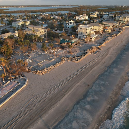 FILE - Waves roll in from the Gulf of Mexico toward lots where only empty foundations and debris remain after homes were swept away in Hurricane Milton on Manasota Key in Englewood, Fla., Oct. 13, 2024. (AP Photo/Rebecca Blackwell, File)