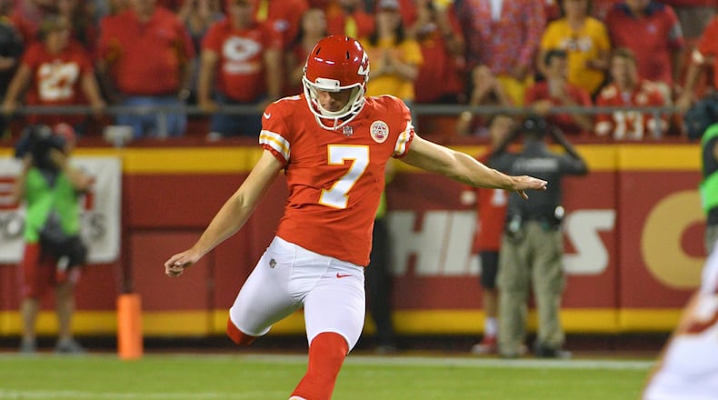 Kansas City Chiefs kicker Harrison Butker (7) kicks the opening kickoff during the game against the Washington Redskins at Arrowhead Stadium.