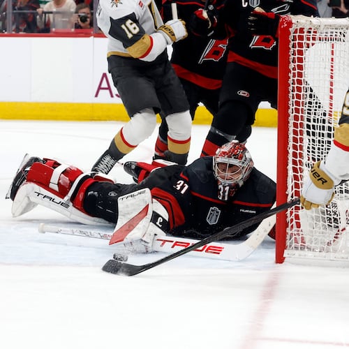 Carolina Hurricanes goaltender Frederik Andersen (31) stops a shot byf Vegas Golden Knights' Ivan Barbashev (49) during the third period in Game 2 of the NHL hockey Stanley Cup Final series in Raleigh, N.C., Thursday, June 4, 2026. (AP Photo/Karl DeBlaker)