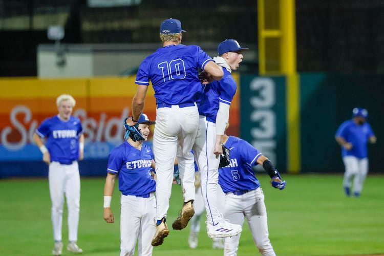 Etowah Eagles pitcher Matthew Sharman and Etowah Eagles center fielder Trevor Condon celebrate with teammates after defeating North Paulding 2-1 during Game 1 of the Class 6A GHSA baseball finals at Gwinnett Field on Tuesday, May 26, 2026, in Lawrenceville, Ga. (Miguel Martinez/AJC)