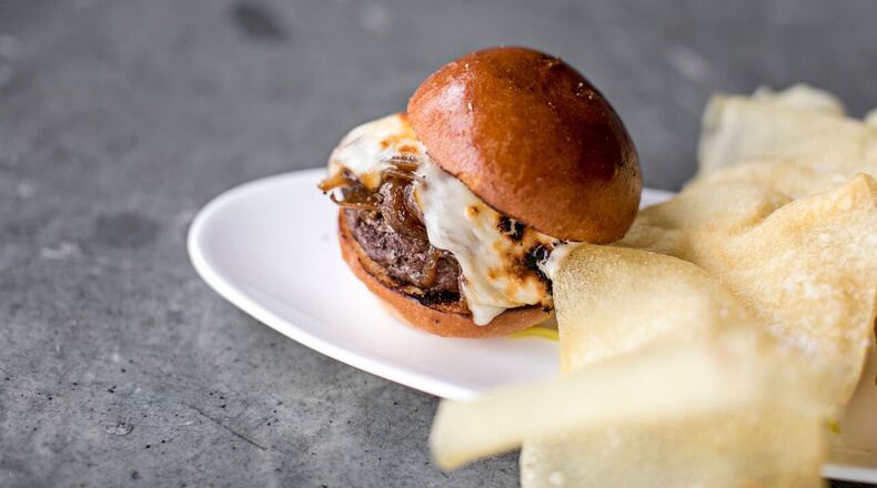 The Cut Bar offers half-priced appetizers and $1 chef's choice oysters weekdays. Photo credit: Heidi Geldhauser.