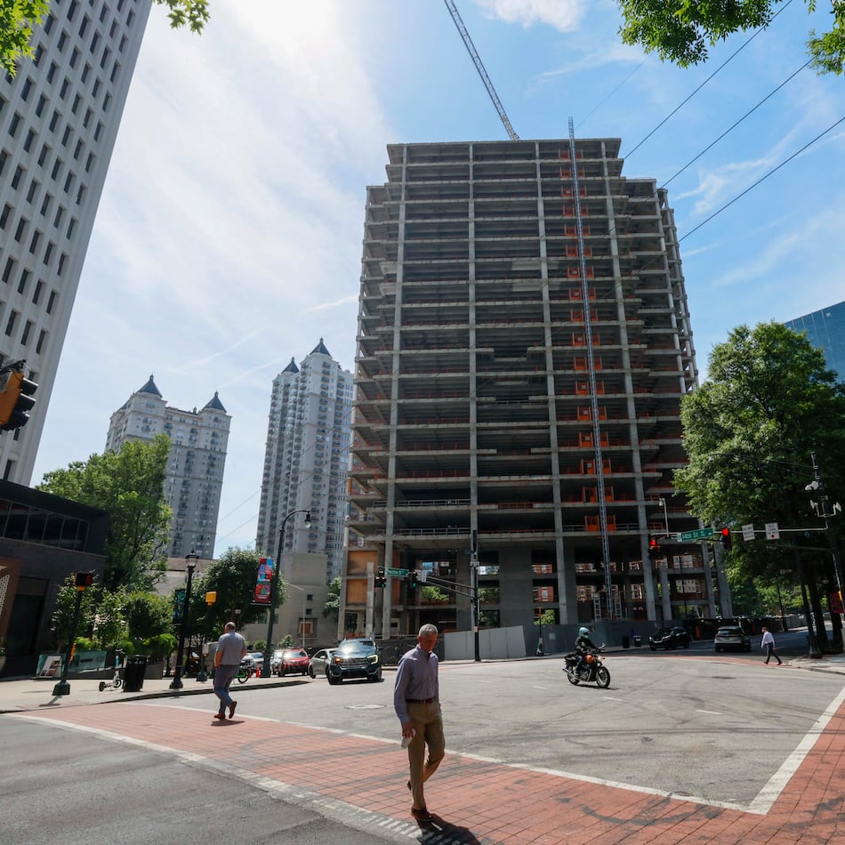 The Campanile building is visible from Peachtree Street NE and 14th Street on Tuesday, May 19, 2026. The well-known Midtown construction site has remained incomplete for years. Local residents are unhappy with the slow progress, and some city officials have taken notice. (Miguel Martinez/AJC)