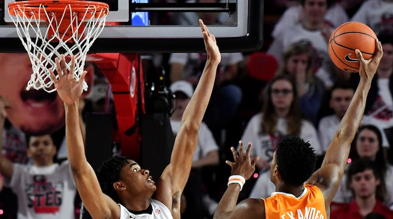 Kyle Alexander of Tennessee tries to shoot over Nicolas Claxton of Georgia during the basketball game at Stegeman Coliseum on February 17, 2018 in Athens, Georgia. (Photo by Mike Comer/Getty Images)
