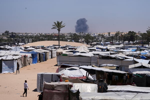 Smoke rises from an Israeli army airstrike south of Khan Younis, Gaza, Wednesday, May 21, 2025. (AP Photo/Abdel Kareem Hana)