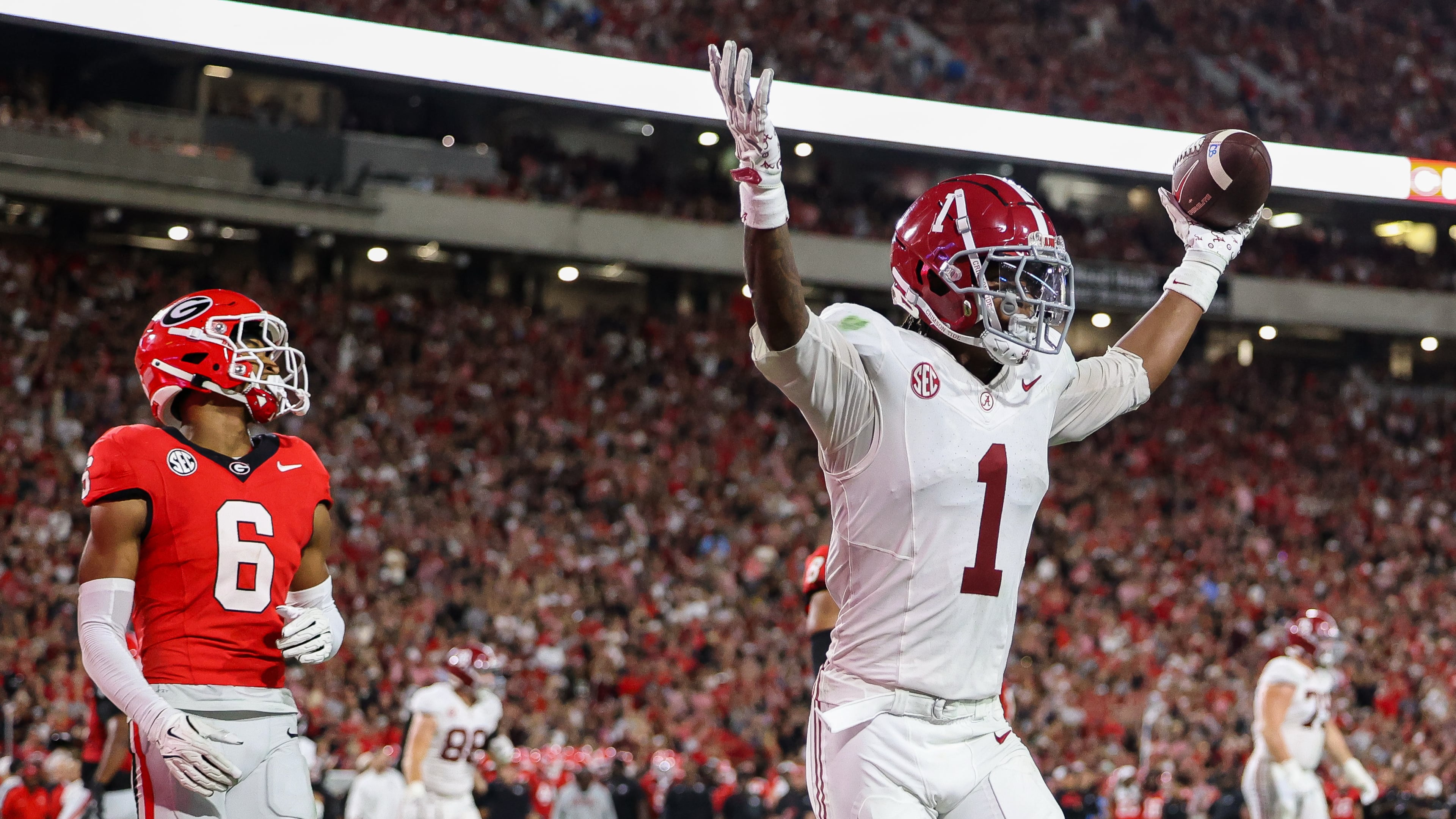 Alabama wide receiver Isaiah Horton (1) reacts after scoring a touchdown in the first half of an NCAA college football game against Georgia, Saturday, Sept. 27, 2025, in Athens, Ga. (AP Photo/Colin Hubbard)