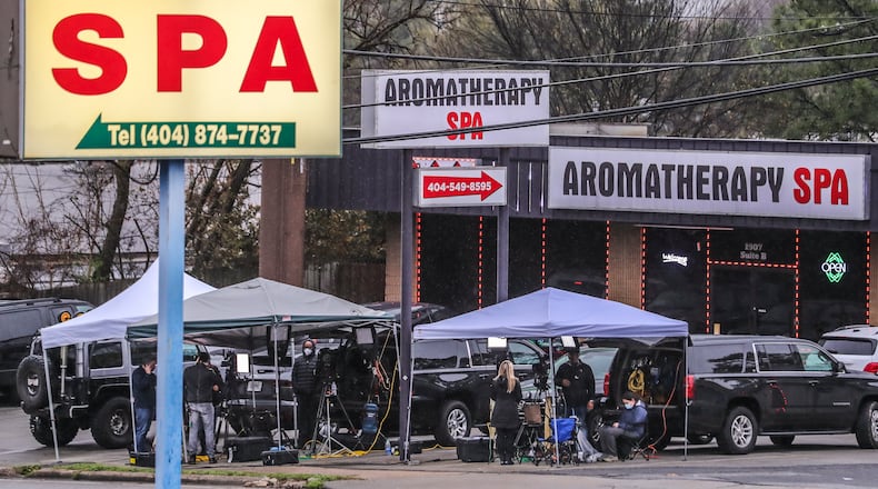 March 17, 2021 Atlanta: The National media camped out in front of the Gold Spa and Aromatherapy Spa on Piedmont Road in Atlanta on Wednesday morning, March 17, 2021 where Atlanta officers found four women shot to death Tuesday night. Cherokee County Sheriff Frank Reynolds said Wednesday the suspect in a metro Atlanta spa shooting spree that killed eight people bought the gun he used hours earlier. Investigators also believe 21-year-old Robert Aaron Long, accused in the shootings in Cherokee County and northeast Atlanta, may have a sexual addiction and frequented the types of businesses he allegedly targeted. ”During his interview, he gave no indicators that this was racially motivated,” Reynolds said. “We asked him that specifically and the answer was no.” But Long did take responsibility for the shootings, Capt. Jay Baker with the Cherokee sheriff’s office said Wednesday. Long, according to Baker, said the massage parlors represented a “temptation he wanted to eliminate.” “Yesterday was a really bad day for him and this is what he did,” Baker said at a joint news conference with the Atlanta Police Department. Reynolds said Long bought a gun from a Cherokee shop prior to the shootings. A 9mm firearm was found when Long was arrested in Crisp County, about 150 miles south of Atlanta. Investigators believe Long is the suspect in shootings at three spas that happened about an hour apart Tuesday afternoon. (John Spink / John.Spink@ajc.com)