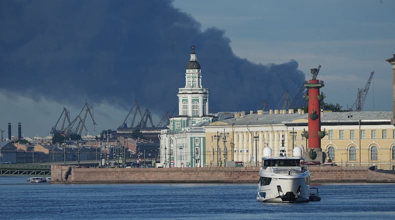 A plumes of black smoke is seen over the port of St. Petersburg, Russia, Wednesday, June 3, 2026, after a Ukrainian drone attack. (AP Photo)