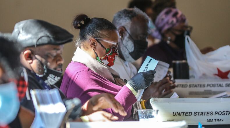 November 4, 2020 Atlanta: Fulton County election workers started counting and scanning ballots again on Wednesday Nov. 4, 2020 as the State and the Nation waited for the results. Fulton County elections head Richard Barron said he expects results from the tens of thousands of outstanding absentee-by-mail ballots by 9 p.m. Wednesday. People across the nation are eagerly watching to see whether Fulton County home to Atlanta, the South’s crown jewel, and 1 million residents can help former Vice President Joe Biden beat President Donald Trump. There were 63,000 outstanding Fulton absentee ballots, which is about 27% of Georgia’s 236,000 uncounted absentee ballots Wednesday morning. That was enough to keep the nation biting its nails and waiting on Fulton. (John Spink / John.Spink@ajc.com)
