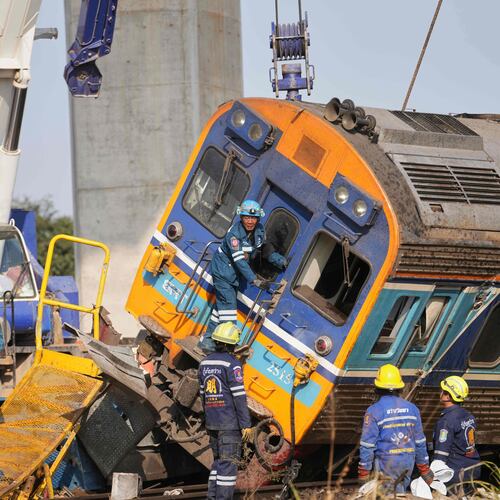 Rescuers work amidst the wreckage after a construction crane fell into a passenger train in Nakhon Ratchasima province, Thailand, Wednesday, Jan.14, 2026. (AP Photo/Sakchai Lalit))