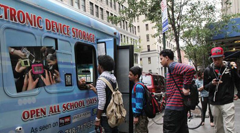 Before New York City lifted its ban on cell phones in schools this year, students paid to store them at mobile storage trucks parked near their schools.