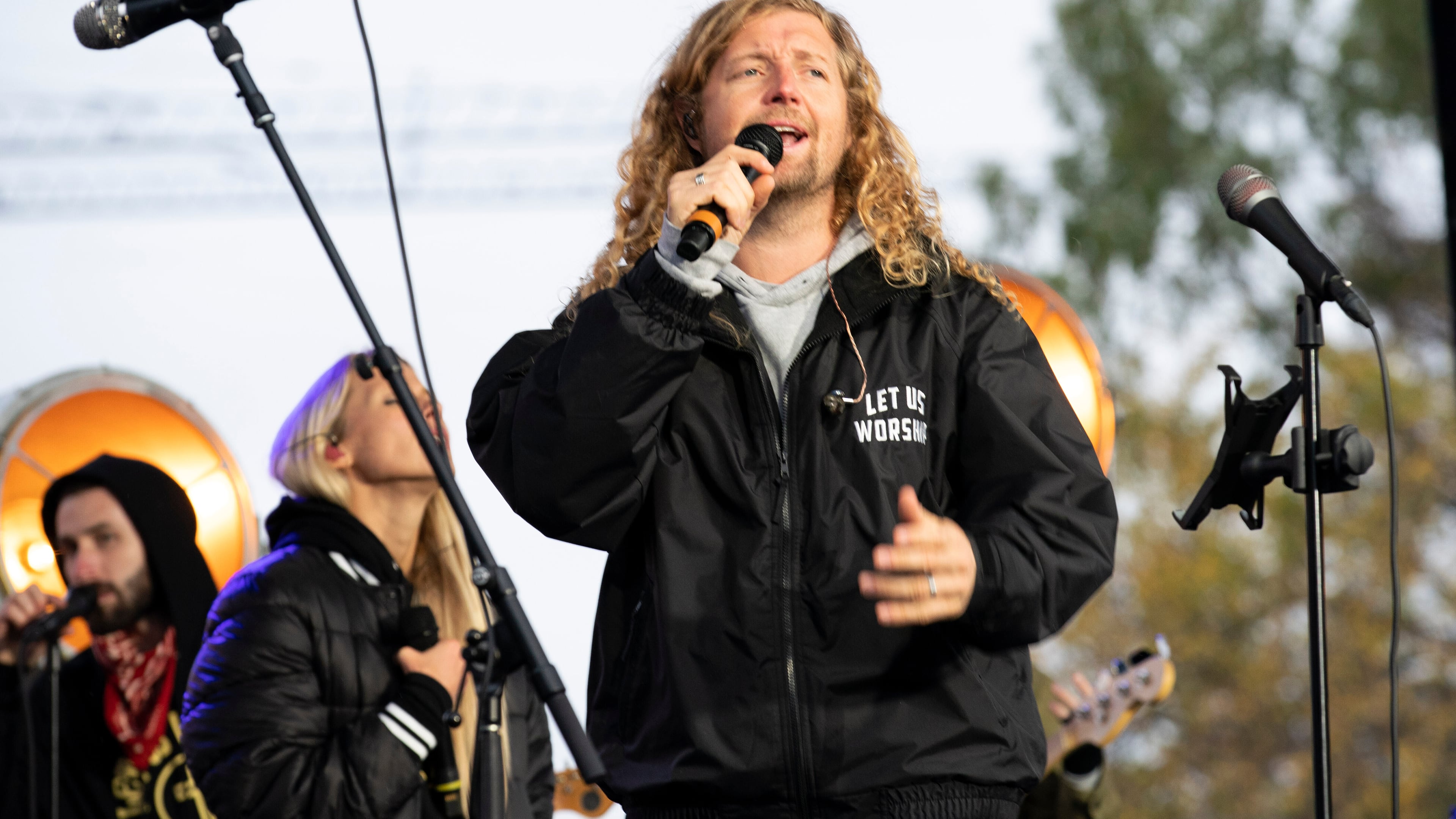 FILE- Christian musician Sean Feucht of California preaches to the crowd during a rally at the National Mall in Washington, Sunday, Oct. 25, 2020. (AP Photo/Jose Luis Magana, file)