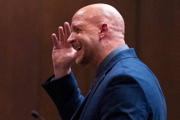 Shelby County deputy district attorney Paul Hagerman gestures to his head while discussing Tyre Nichol's head injuries as he gives the prosecution's opening statement during the first day of the state criminal trial for the death of Nichols at 201 Poplar in Memphis, Tenn., on Monday, April 28, 2025. (Chris Day/Commercial Appeal/USA Today Network, via AP, Pool)