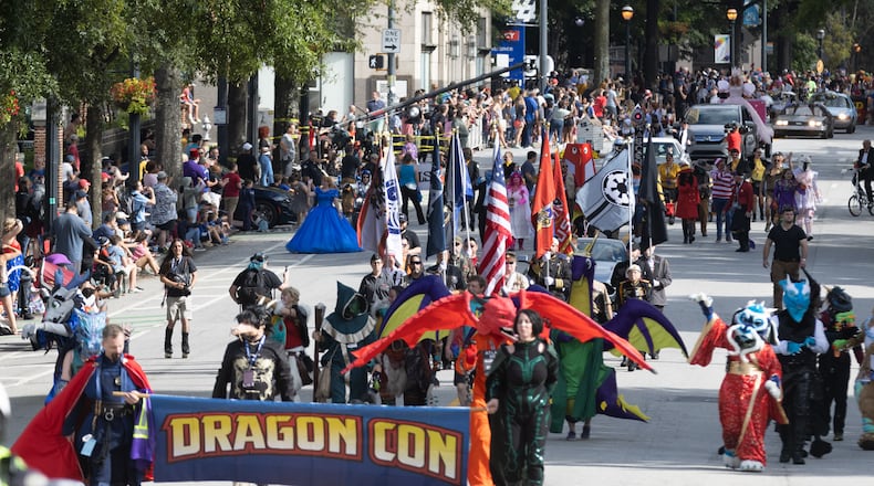 The Dragon Con Parade, pictured here in 2022, marches up Peachtree Street this year beginning at 10 a.m. Saturday, Sept. 2. Steve Schaefer/steve.schaefer@ajc.com)