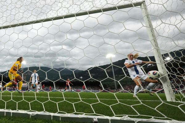Finland goalkeeper Anna Koivunen, at left, and teammate Nea Lehtola, at right, fail to stop a goal from Norway's Caroline Graham during the Euro 2025, group A, soccer match between Norway and Finland at Stade de Tourbillon in Sion, Switzerland, Sunday, July 6, 2025. (AP Photo/Alessandra Tarantino)