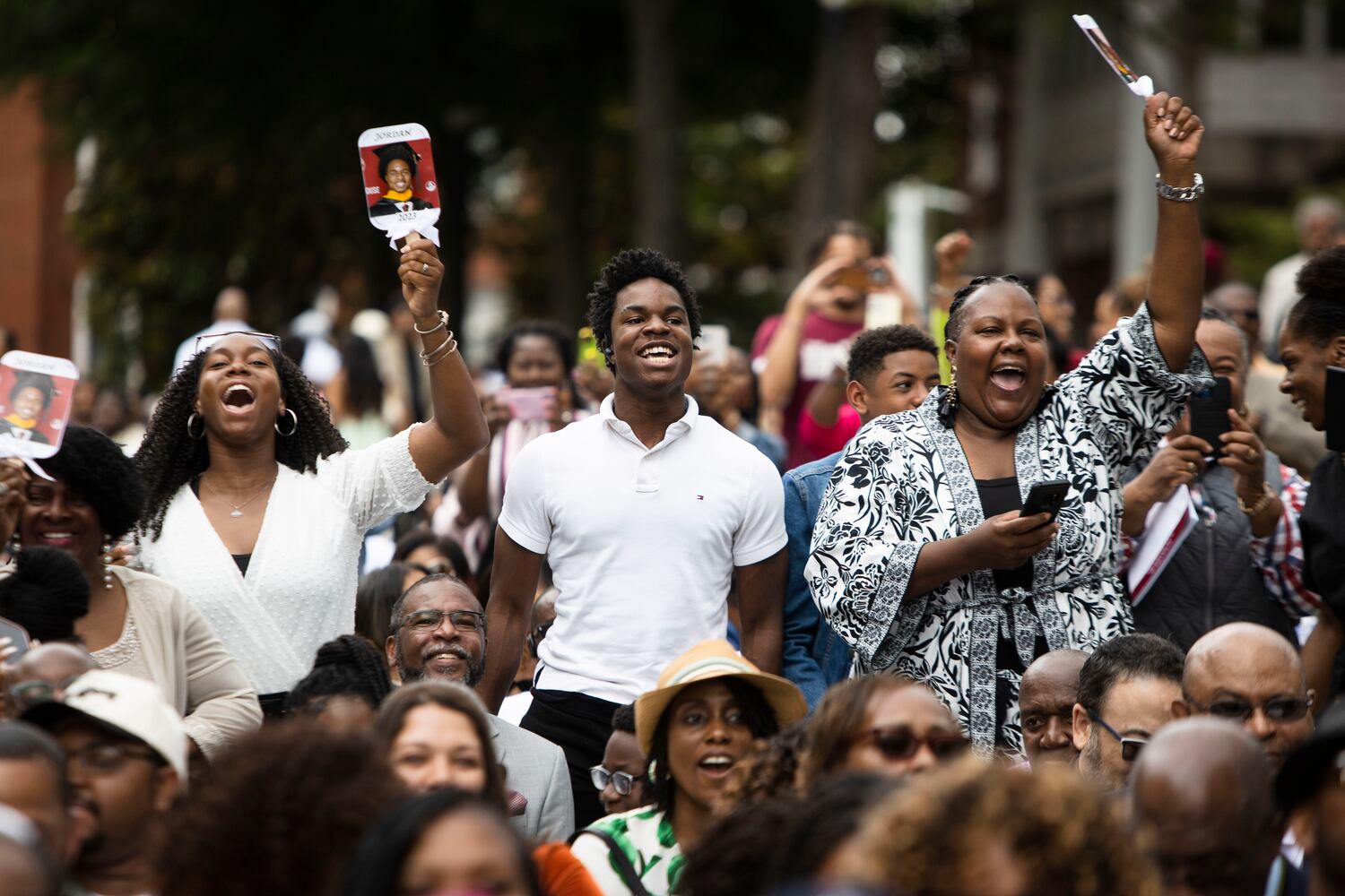 Family members cheer for their graduate during the Morehouse College commencement ceremony on Sunday, May 21, 2023, on Century Campus in Atlanta. The graduation marked Morehouse College's 139th commencement program. CHRISTINA MATACOTTA FOR THE ATLANTA JOURNAL-CONSTITUTION