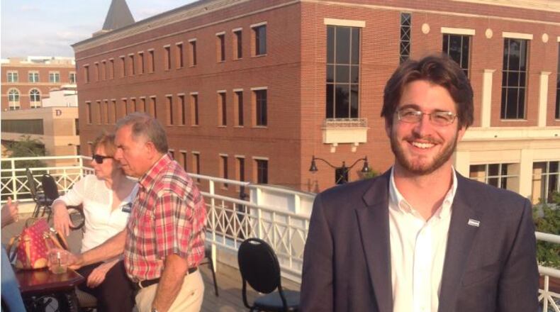 Mack Burgess, manager of Tricia Pridemore's unsuccessful bid for Congress, at a Marietta Square election party in May. AJC/Jim Galloway