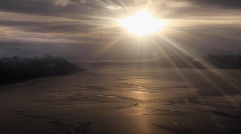 The sun rises near Anchorage, Alaska.