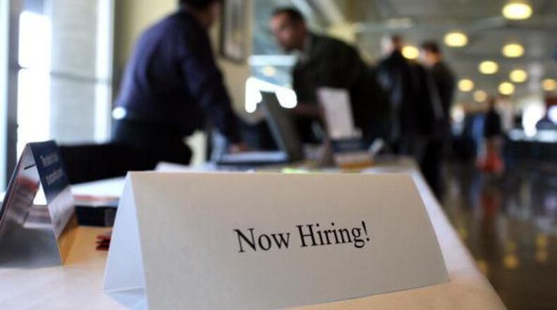 Apple One is working with the Georgia Department of Labor to host a hiring event on July 30. AJC file photo