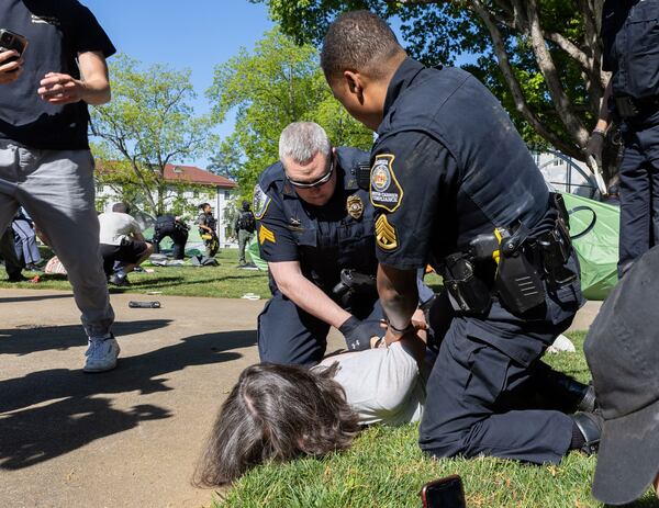 Police arrest pro-Palestinian protesters who set up an encampment at the Emory campus in Atlanta on Thursday, April 25, 2024. (Arvin Temkar/The Atlanta Journal-Constitution/TNS)