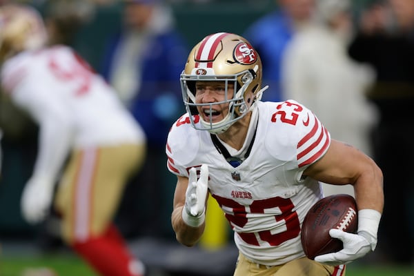 FILE - San Francisco 49ers running back Christian McCaffrey (23) warms up before an NFL football game against the Green Bay Packers on Sunday, Nov. 24, 2024 in Green Bay, Wis. (AP Photo/Matt Ludtke, File)