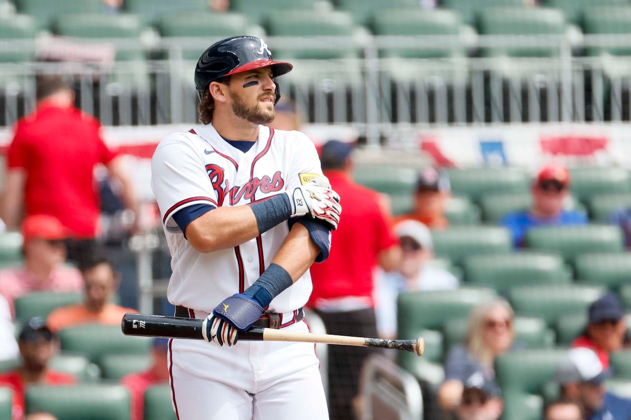 Braves second baseman Austin Riley adjusts his elbow pad during the second inning against the Athletics at Truist Park on Wednesday, April 1, 2026. (Miguel Martinez/AJC)