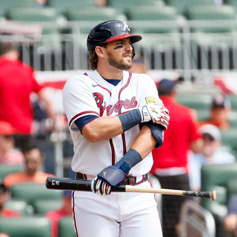 Braves second baseman Austin Riley adjusts his elbow pad during the second inning against the Athletics at Truist Park on Wednesday, April 1, 2026. (Miguel Martinez/AJC)