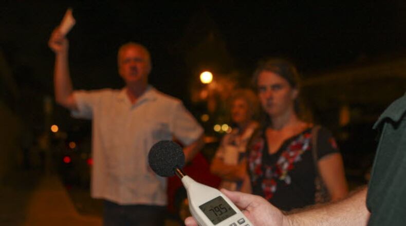 A Palm Beach County Sheriff's deputy holds up a sound meter. If proposed changes to a noise ordinance pass in Sandy Springs, the city’s police officers will have readers like this one.