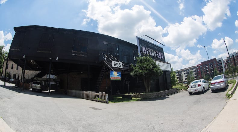 The Masquerade is still hanging on in its old location.