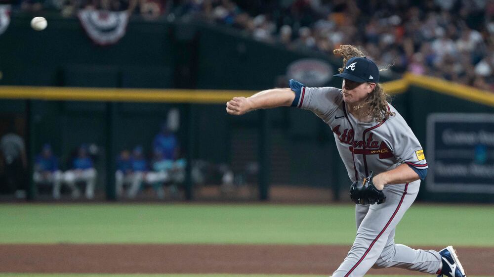 Braves pitcher Grant Holmes throws against the Diamondbacks on Friday, April 3, 2026, in Phoenix. Holmes’ gem Friday lengthened the team’s eight-game stretch of solid pitching to start the year. (Rebecca Noble/AP)
