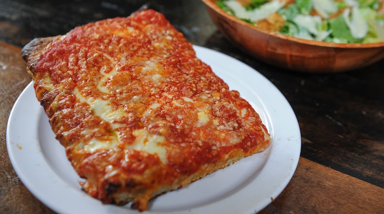 Brooklyn Sicilian slice and caesar salad from O4W Pizza.