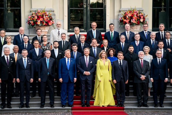 US President Donald Trump, center left, along with the King Willem-Alexander and Queen Maxima of the Netherlands, center, poses for a family photo at the 2025 NATO summit in The Hague, on Tuesday, June 24, 2025. (Haiyun Jiang/Pool Photo via AP)