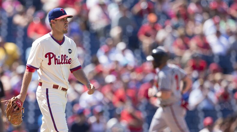 PHILADELPHIA, PA - AUGUST 2: Adam Morgan #39 of the Philadelphia Phillies reacts as Jonny Gomes #7 of the Atlanta Braves rounds third base after after a three run home run to Jace Peterson #8 (NOT PICTURED) in the top of the fifth inning on August 2, 2015 at the Citizens Bank Park in Philadelphia, Pennsylvania. The Braves defeated the Phillies 6-2. (Photo by Mitchell Leff/Getty Images)