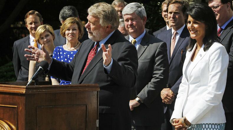 South Carolina Gov. Nikki Haley, right, looks pleased as Commerce Secretary Bobby Hitt talks about the Volvo plant.