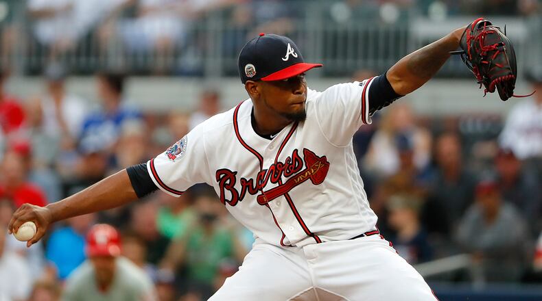 ATLANTA, GA - AUGUST 08: Julio Teheran #49 of the Atlanta Braves pitches in the first inning against the Philadelphia Phillies at SunTrust Park on August 8, 2017 in Atlanta, Georgia. (Photo by Kevin C. Cox/Getty Images)