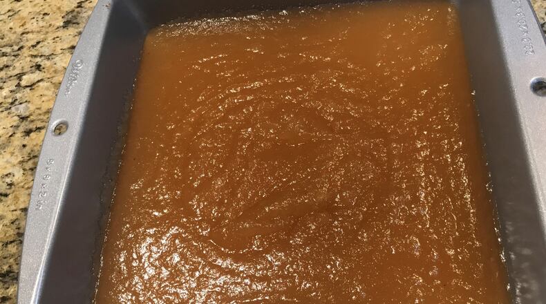 Apple Membrillo is a twist on traditional Spanish membrillo made with quince paste. After you combine apple meal and sugar, the mixture is transferred to a pan to firm up like jelly. It is a delicious accompaniment to a cheese plate. LIGAYA FIGUERAS / LFIGUERAS@AJC.COM