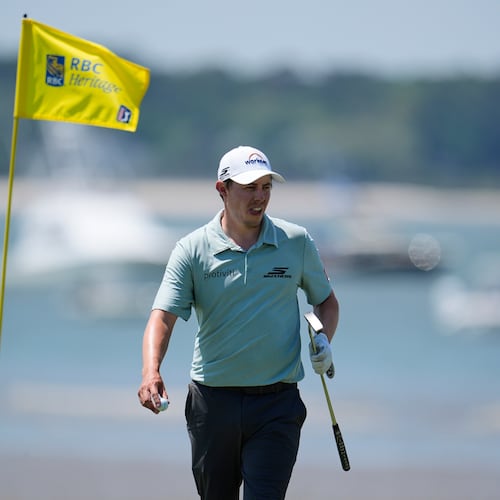 Matt Fitzpatrick, of England, prepares to putt on the 18th hole during the second round at the RBC Heritage golf tournament Friday, April 17, 2026, in Hilton Head, S.C. (AP Photo/Mike Stewart)
