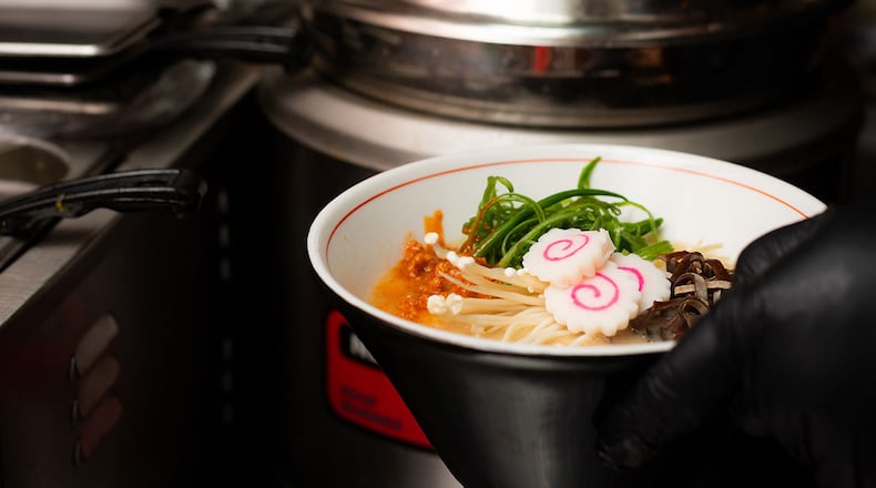 RAMEN: The Naruto Ramen at Yakitori Jinbei, chef Jae Choi incorporates three types of pork bones, chicken bones and dried fish into the broth. Toppings include cashu (braised pork belly), wood ear and enoki mushroom, spring onions and a soft-boiled egg.