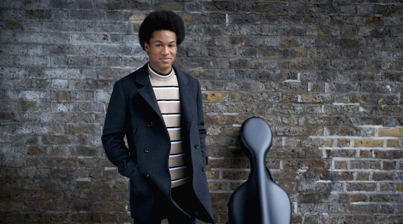In this undated handout supplied by Kensington Palace, cellist Sheku Kanneh-Mason, who performed Saturday, May 19, 2018, at the wedding of Prince Harry and Meghan Markle, poses for a photograph.