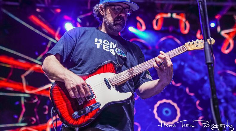 Sam Holt (pictured here) worked as guitar tech for the late Michael Houser, guitarist for Widespread Panic. Houser became his friend and mentor. Photo: Courtesy of Home Team Photography
